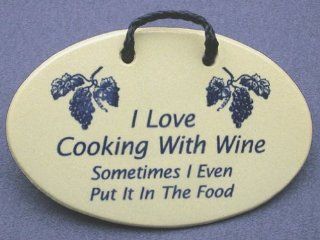 I Love Cooking With Wine. Sometimes I Even Put It In The Food. Mountain Meadows Pottery ceramic plaques and wall art signs with sayings and quotes about wine and cooking. Made by Mountain Meadows Pottery in the USA.   Mountain Meadows Pottery