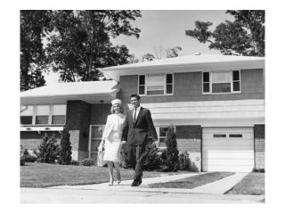 Young couple walking across front yard outside house Poster Print (18 x 24)