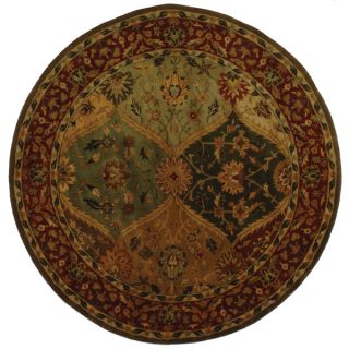 Safavieh Handmade Heritage Kerman Burgundy Wool Rug (76 x 96 Oval)