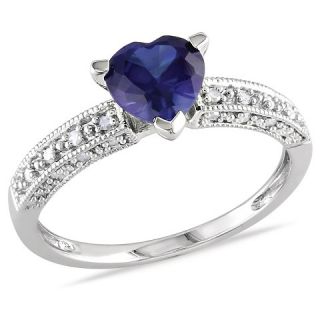 CT. T.W. Heart Shaped Blue Sapphire and 1/10 CT. T.W. Diamond Ring